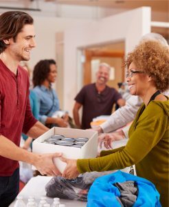 person donating to nonprofit